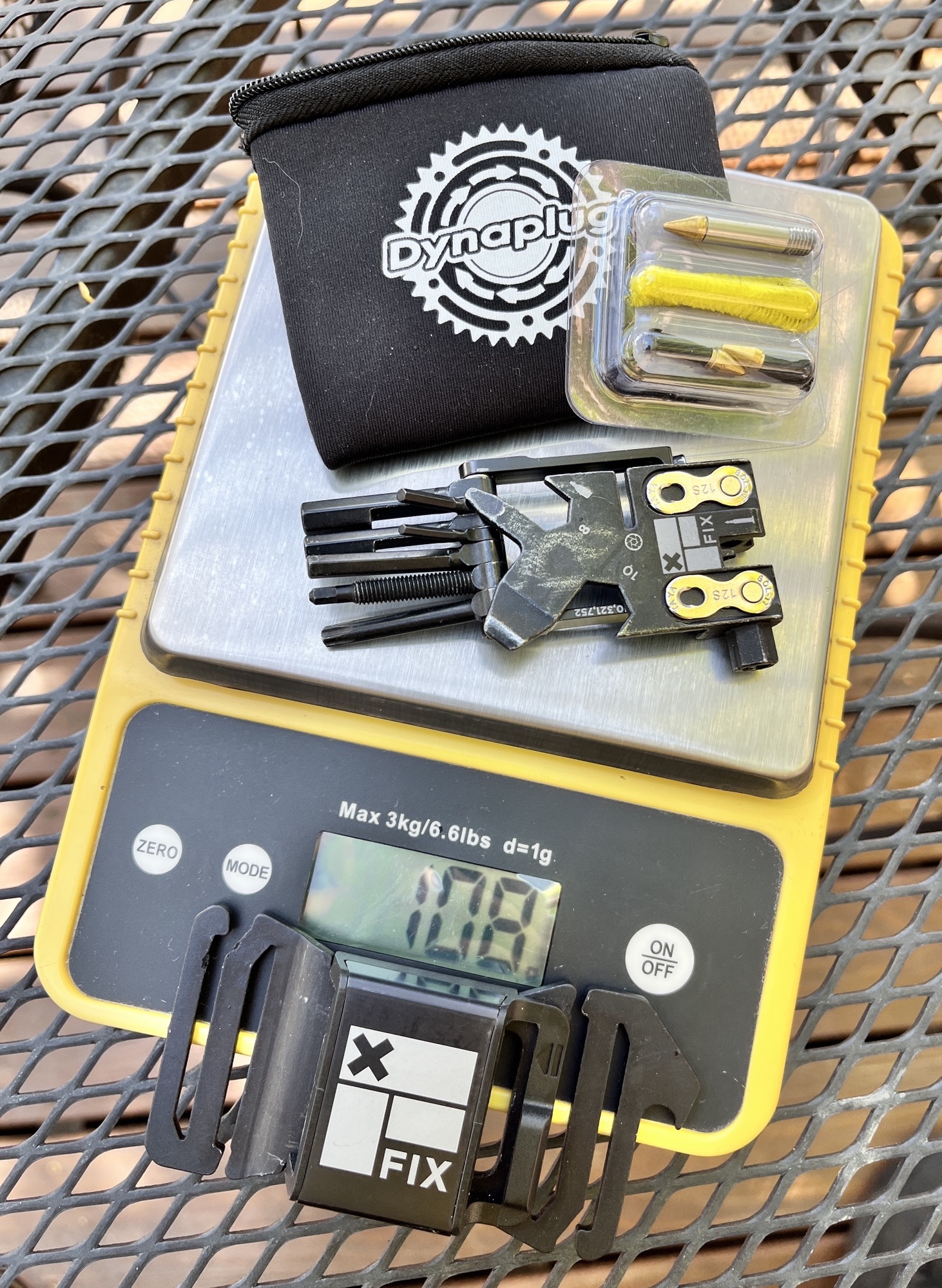 Pic 2 - Wheelie Wrench Pro, Dynaplug on scale; wide Strap On Tool Holster