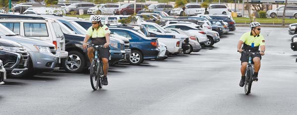 Bike detail to police airport parking lot