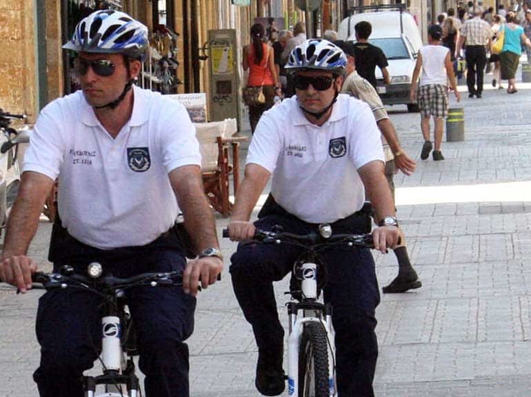 Two charged after attacking police on bikes