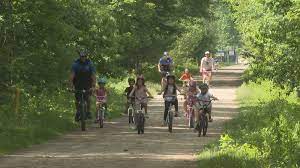 Community rides bikes with Biddeford Police officers in “Bike with a Cop” event