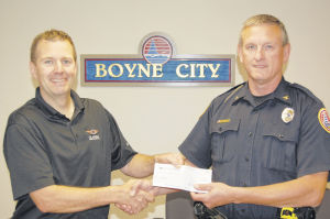 Classic Instruments makes donation for police bike patrols