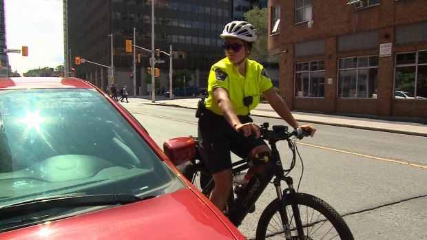 Ottawa police and parking control officers patrolling on e-bikes