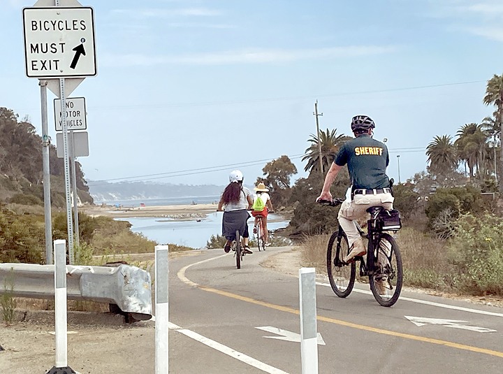 Cycling with the Cops: Officers in Isla Vista ride bikes with local youth during COVID-19
