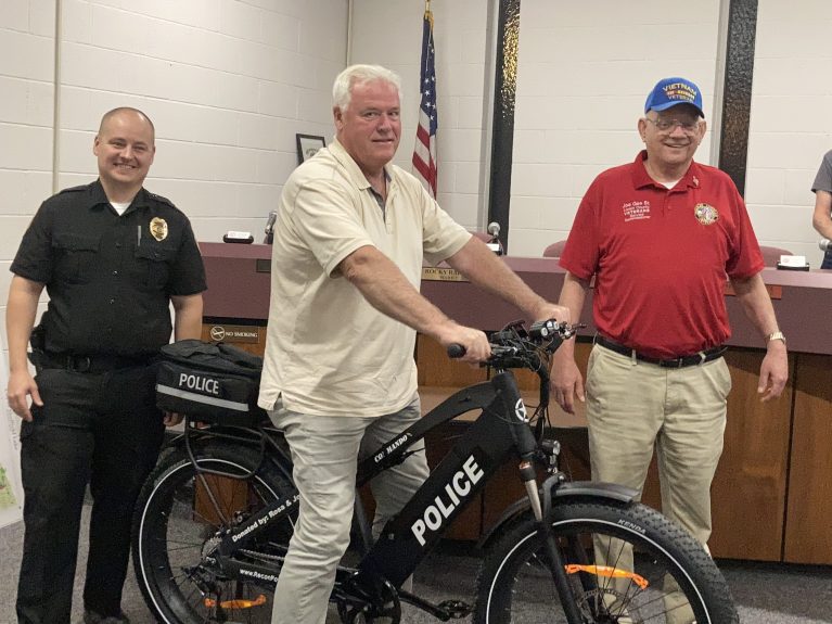 Sheffield Lake couple donates electric bicycle to police
