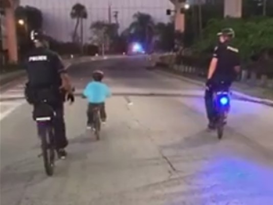 Boy finishes onbikes charity ride with Tampa police by his side