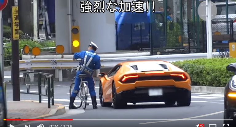 Japanese police officer pursues, pulls over Lamborghini supercar…while on a bicycle