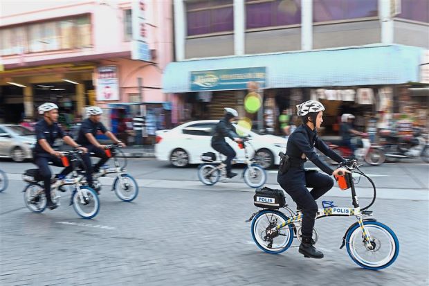 Penang police to patrol busy streets with e-bikes