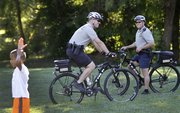 Lawrence police bike patrol makes officers as visible, or stealthy, as needed