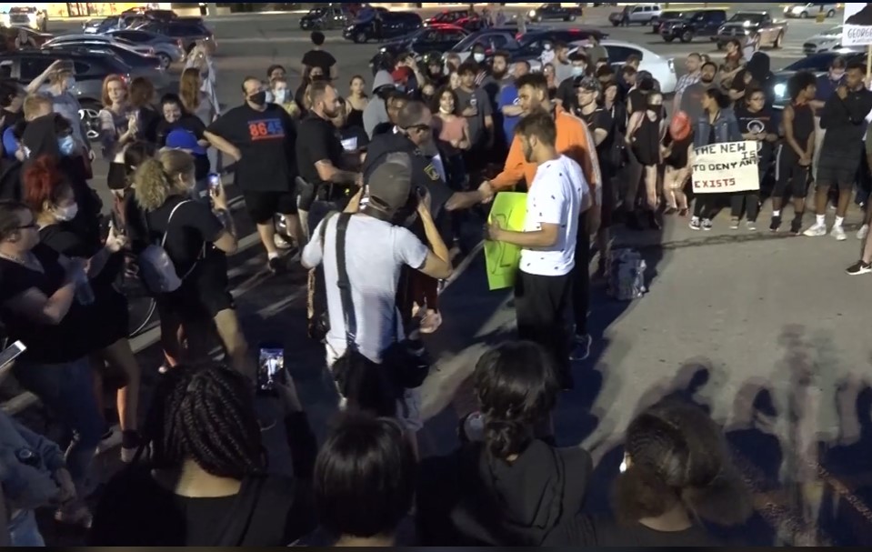 Topeka police, protestors find common ground at rally